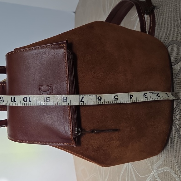 MC Buenos Aires Suede Sling Backpack!